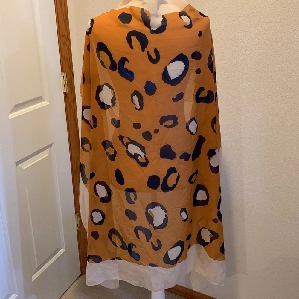 3.1 Phillip Lim Womens Silk multi use scarf. Kind of a burnt orange animal print